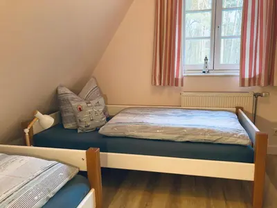 Ein Bett oder Betten in einem Zimmer der Unterkunft Achtern Diek 12b - Wohnung 5