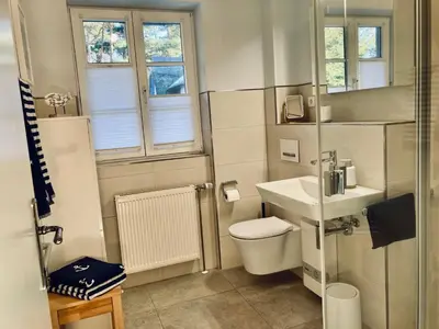 Ein Badezimmer in der Unterkunft Achtern Diek 12b - Wohnung 5