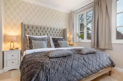Ein Bett oder Betten in einem Zimmer der Unterkunft Zingst Deluxe