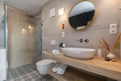Ein Badezimmer in der Unterkunft Suite Seablue