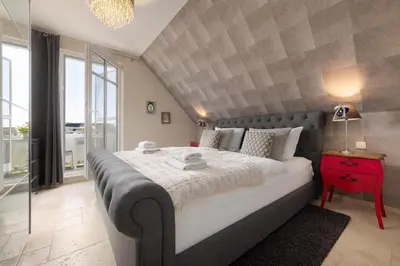 Ein Bett oder Betten in einem Zimmer der Unterkunft Strandkrone