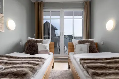 Ein Bett oder Betten in einem Zimmer der Unterkunft Strandkrone