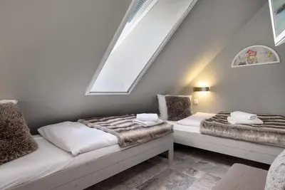 Ein Bett oder Betten in einem Zimmer der Unterkunft Sonnenresidenz
