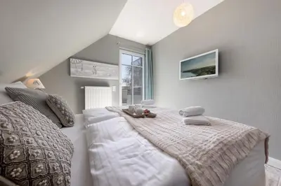 Ein Bett oder Betten in einem Zimmer der Unterkunft Sonnenresidenz