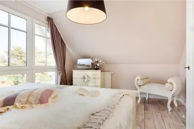 Ein Bett oder Betten in einem Zimmer der Unterkunft Küstentraum