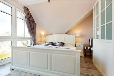 Ein Bett oder Betten in einem Zimmer der Unterkunft Ostseezauber