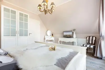 Ein Bett oder Betten in einem Zimmer der Unterkunft Ostseezauber