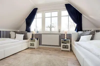 Ein Bett oder Betten in einem Zimmer der Unterkunft Ostseezauber