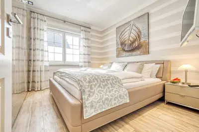 Ein Bett oder Betten in einem Zimmer der Unterkunft Rosenberg 27