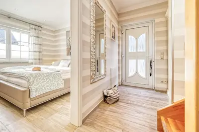 Ein Bett oder Betten in einem Zimmer der Unterkunft Rosenberg 27