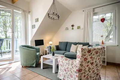 Ein Sitzbereich in der Unterkunft Aabenraa 2 4