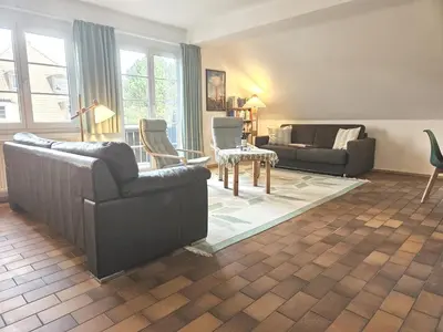 Ein Sitzbereich in der Unterkunft Resi E 7