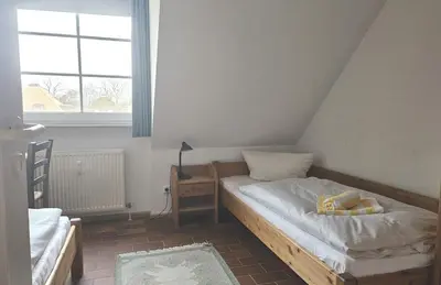 Ein Bett oder Betten in einem Zimmer der Unterkunft Resi E 7