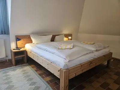 Ein Bett oder Betten in einem Zimmer der Unterkunft Resi E 7