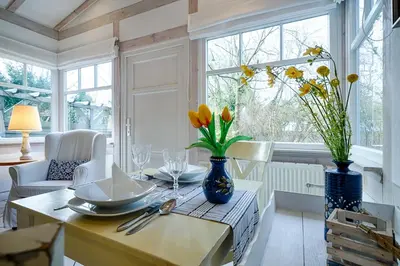Ein Sitzbereich in der Unterkunft Gartenhaus