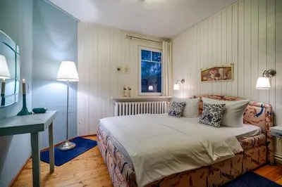 Ein Bett oder Betten in einem Zimmer der Unterkunft Kapitänssuite