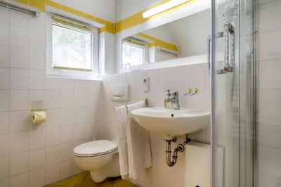 Ein Badezimmer in der Unterkunft Trident Wohnung 2