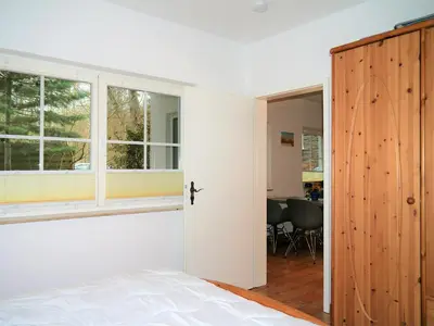 Ein Bett oder Betten in einem Zimmer der Unterkunft Waldsiedlung 18 Haus 12 Wo 1
