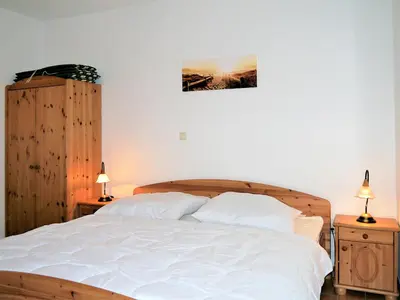 Ein Bett oder Betten in einem Zimmer der Unterkunft Waldsiedlung 18 Haus 12 Wo 1