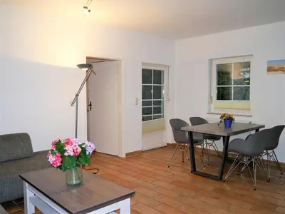 Ein Sitzbereich in der Unterkunft Waldsiedlung 18 Haus 12 Wo 1