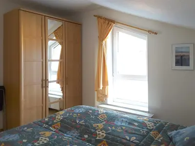 Ein Bett oder Betten in einem Zimmer der Unterkunft Haus Freya Wo 3