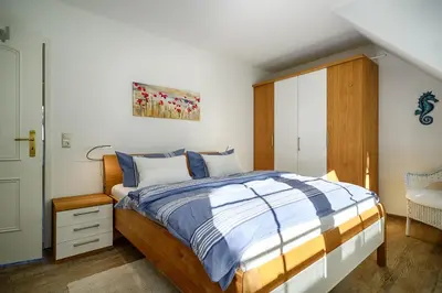 Ein Bett oder Betten in einem Zimmer der Unterkunft Mühlenpark 1 Mühlenpark Haus 3 Wo 12
