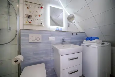 Ein Badezimmer in der Unterkunft Mühlenpark 1 Mühlenpark Haus 3 Wo 12