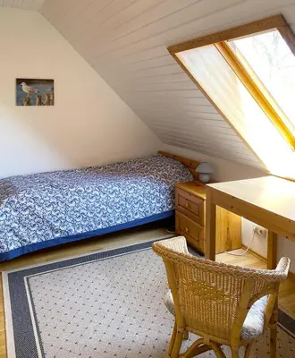 Ein Bett oder Betten in einem Zimmer der Unterkunft Ferienhaus Georg