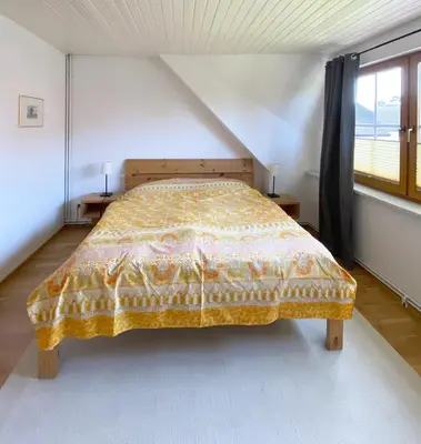 Ein Bett oder Betten in einem Zimmer der Unterkunft Ferienhaus Georg