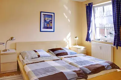 Ein Bett oder Betten in einem Zimmer der Unterkunft Havelland W 2