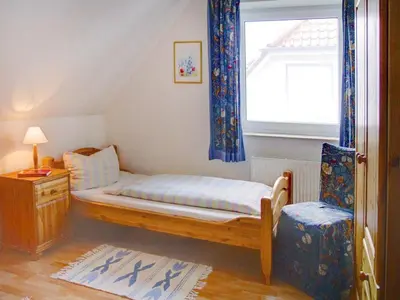 Ein Bett oder Betten in einem Zimmer der Unterkunft Haus Nordlicht