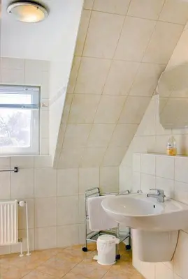 Ein Badezimmer in der Unterkunft Haus Nordlicht