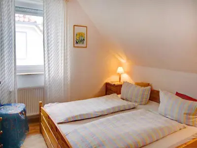 Ein Bett oder Betten in einem Zimmer der Unterkunft Haus Nordlicht