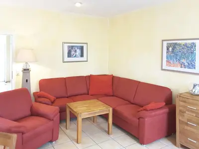 Ein Sitzbereich in der Unterkunft Kapitänshaus Mühlenpark Haus 6 Wo 21