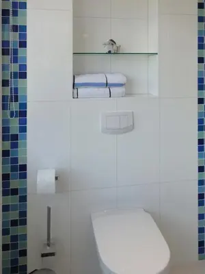 Ein Badezimmer in der Unterkunft Wiecker Landhus FHH 2