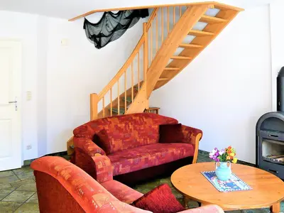 Ein Sitzbereich in der Unterkunft Haus Anna