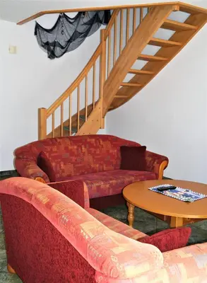 Ein Sitzbereich in der Unterkunft Haus Anna