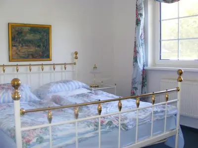 Ein Bett oder Betten in einem Zimmer der Unterkunft Hafenkoje Wo 2