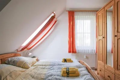Ein Bett oder Betten in einem Zimmer der Unterkunft Haus 