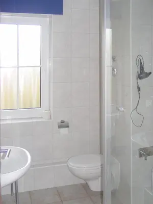 Ein Badezimmer in der Unterkunft Haus 