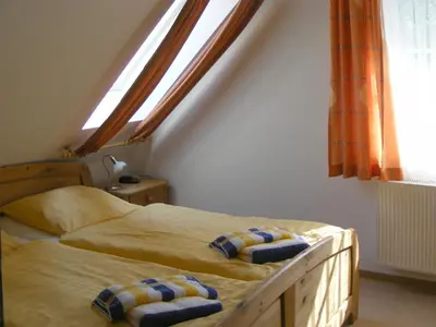 Ein Bett oder Betten in einem Zimmer der Unterkunft Haus 