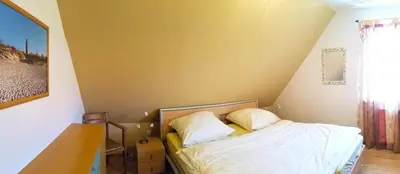 Ein Bett oder Betten in einem Zimmer der Unterkunft Buchenpark Wo 3