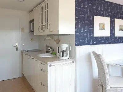 Küche/Küchenzeile in der Unterkunft Kapitänshaus Mühlenpark Haus 6 Wo 26