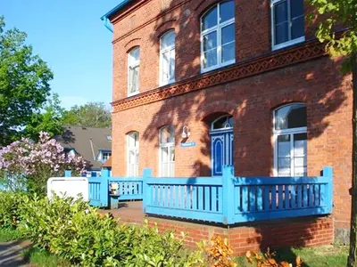 Ein Garten an der Unterkunft Kapitänshaus Mühlenpark Haus 6 Wo 26