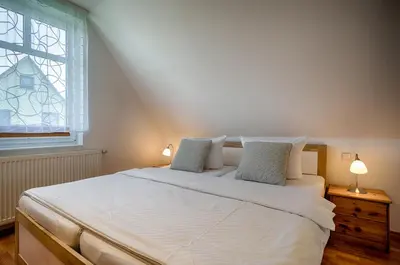 Ein Bett oder Betten in einem Zimmer der Unterkunft Trident Wohnung 3
