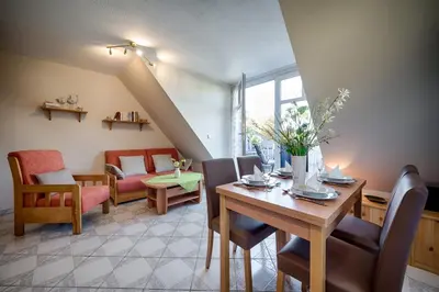 Ein Sitzbereich in der Unterkunft Trident Wohnung 3