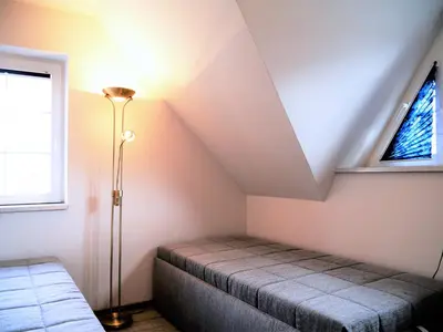 Ein Bett oder Betten in einem Zimmer der Unterkunft Hagenstraße 4