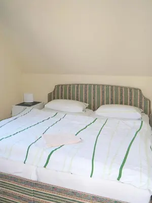 Ein Bett oder Betten in einem Zimmer der Unterkunft Frieseneck Wohnung 20