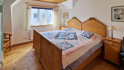 Ein Bett oder Betten in einem Zimmer der Unterkunft Ferienhaus Zaunkönig