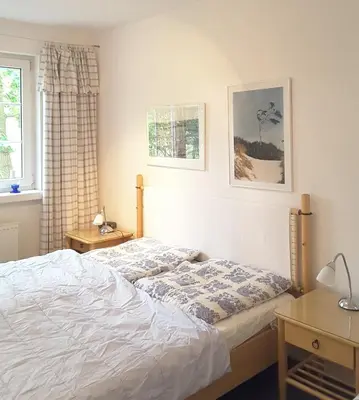 Ein Bett oder Betten in einem Zimmer der Unterkunft Mühlenpark 1 Mühlenpark Haus 3 Wo 9